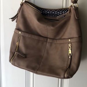 Never worn Miztique purse.
